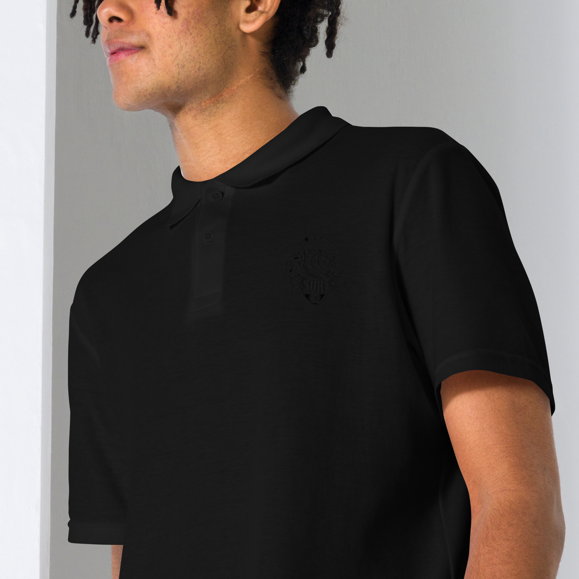 unisex-pique-polo-shirt-black-zoomed-in-65186e97459c0.jpg